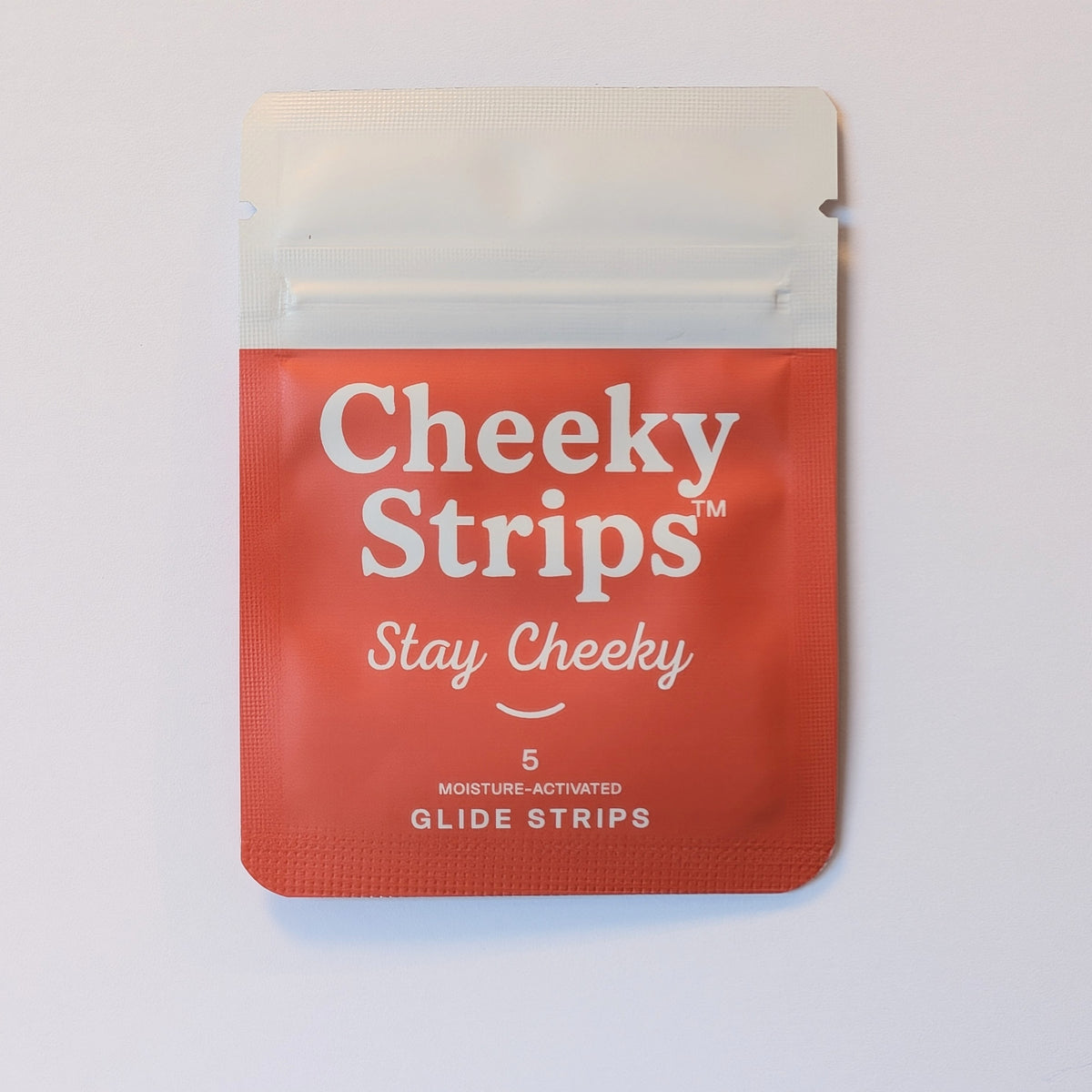 Cheeky Strips pouch, 5 moisture-activated glide strips