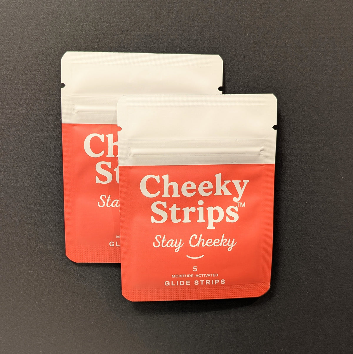 Two Cheeky Strips pouches, 10 glide strips total